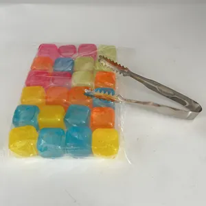 Detail view of reusable colorful plastic ice cubes set with stainless steel ice tong