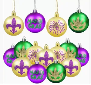 Macro view of 6cm Mardi Gras decorative balls with purple, green and gold glitter patterns