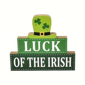 St. Patrick's Day wooden sign featuring a shamrock hat and Luck of the Irish text