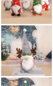 Detail view of plush Christmas gnomes with reindeer antlers and long white beards