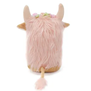 Detailed back view of a pink fluffy Scottish Highland cow plush toy with horns and flowers.
