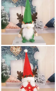 Detailed view of Christmas gnome dolls with reindeer antlers and long festive hats.