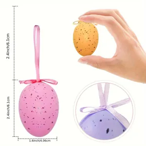 Decorative spotted Easter eggs with hanging ribbons in pink, orange, and purple.