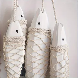 Mediterranean style wooden fish hanging decoration with rustic twine netting