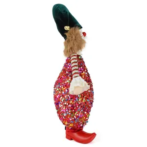 Perfil lateral detallado de un muñeco de payaso con lentejuelas para Navidad