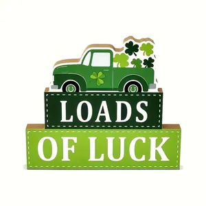 St. Patrick's Day wooden truck decoration with "Loads of Luck" text and shamrock motifs