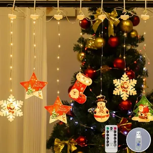 Detailed view of festive LED Christmas curtain lights with stars and Santa ornaments.