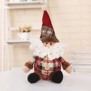 Detailed view of a plush Christmas Santa Claus doll with red plaid hat and white curly beard