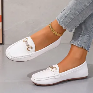 Stylish white pebble leather loafers for women featuring retro gold metal buckle