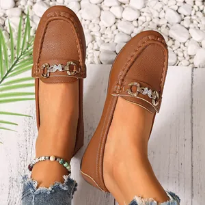 Stylish women's brown leather loafers with vintage metal buckle and butterfly detail