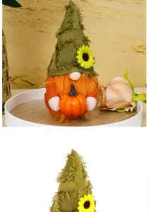 Beautifully handmade Thanksgiving gnome with sunflower and small pumpkin details