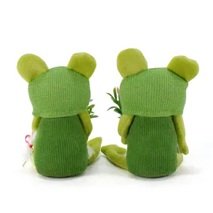 Rear view of two green frog themed plush gnome dolls for indoor home shelf decoration