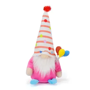 Detailed view of a pink birthday gnome plush doll with colorful balloons and striped hat.
