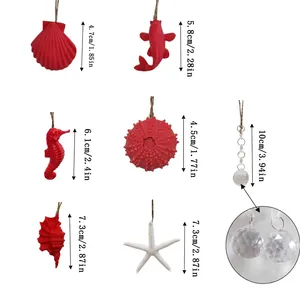 Detail view showing various resin sea creature pendants with precise height measurements.