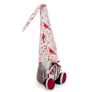 Christmas gnome doll with cardinal bird hat holding forest bird wooden ornament decoration
