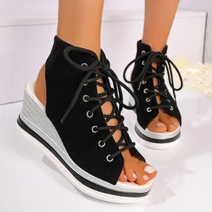 Stylish black lace-up peep-toe wedge sandals for women with a sleek silver heel detail