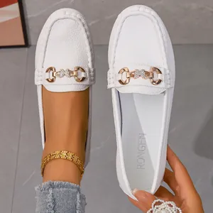 Elegant white textured leather loafers for women featuring a stylish gold metal buckle
