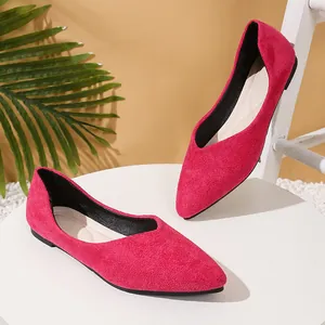 Elegant magenta faux suede pointed-toe flats featuring a soft V-cut design for comfort