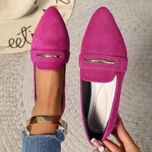 Stylish fuchsia suede pointed-toe flat loafers for women with gold metal bar accents