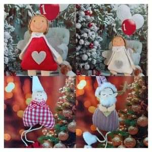 Set of four fabric heart angel pendants for Christmas tree decoration in festive settings