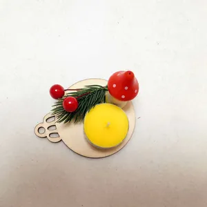 Top view of Christmas mushroom candle holder with wooden base and yellow tea light