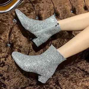 Stylish silver sequined ankle boots for women with chunky heels and side zipper detail