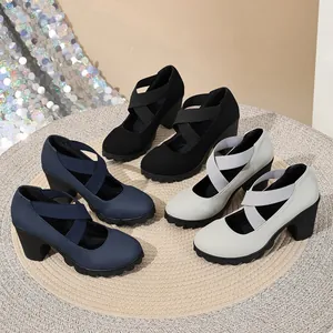 Detailed macro view of women's chunky platform pumps with cross straps in three colors