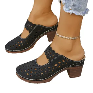 Elegant women's black hollow-out closed-toe mules featuring a thick wooden high heel