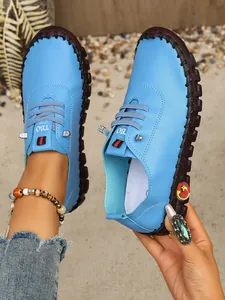 Mocasines planos casuales azules cosidos a mano para mujer con cordones decorativos