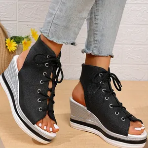 Fashionable black lace-up peep toe wedge sandals with thick striped platform for women