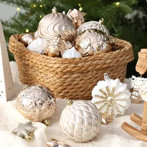 Elegant set of 62 champagne gold hand-painted Christmas ornaments in a rustic woven basket