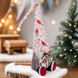 Handcrafted Christmas gnome doll plush with red cardinal bird and winter berry hat