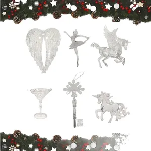 Set of clear acrylic Christmas hanging ornaments including wings, ballerina, and unicorn
