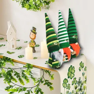 St. Patrick's Day knitted gnomes with striped hats and Luck embroidery