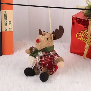 Adorable plush Christmas reindeer ornament in red plaid fabric with hanging loop for tree