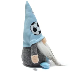 Macro view of a soccer-themed plush gnome doll with soccer ball patterns on blue hat