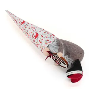 Rustic Christmas gnome plush ornament featuring red cardinal and holly berry prints