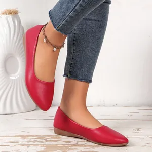 Elegant red pointed-toe flats for women featuring textured leather and comfortable soft sole