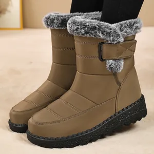 Detailed side view of khaki women's snow boots featuring a plush faux fur collar