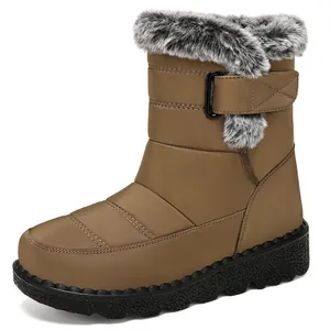 Side view of brown waterproof women's snow boots with faux fur trim and velcro strap
