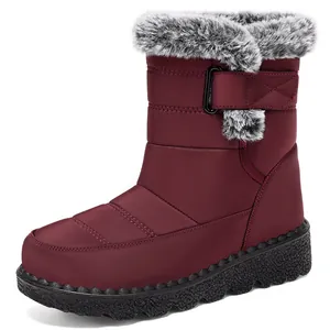 Wine red waterproof snow boot with warm faux fur lining and velcro strap closure.
