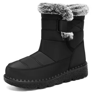 Women's waterproof mid-calf snow boots with faux fur trim and adjustable strap