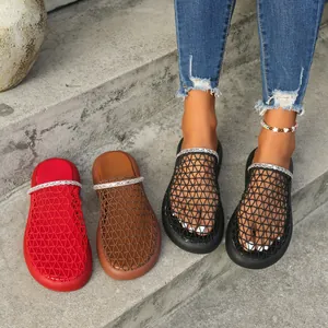 Detail view of breathable mesh mules featuring sparkling rhinestone chain decoration