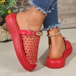 Detailed view of red mesh breathable platform slides with elegant gold buckle decoration