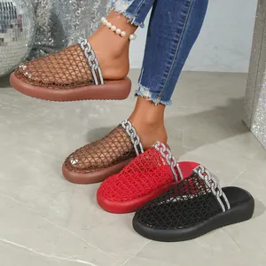 Close-up of stylish mesh mules featuring rhinestone chain accents in brown red and black colors.