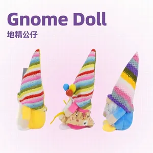 Set of three colorful plush gnome dolls with striped hats for birthday party decorations