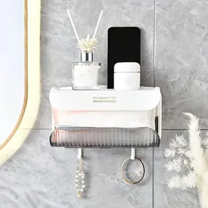 Dettaglio del porta fazzoletti a parete con ripiano superiore e ganci per gli accessori