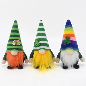 Three St. Patrick's Day gnomes with striped hats and lucky clover designs on white.