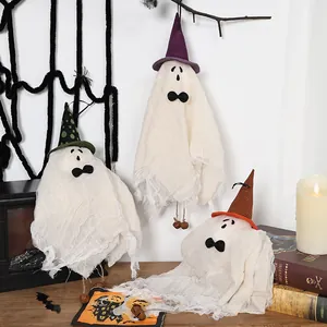 Hanging white Halloween ghosts with witch hats and bow ties for home party decoration