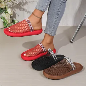 Detailed view of breathable mesh slippers featuring sparkling rhinestone chain accents